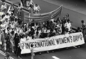 The International Women's Day 1981 Rally started at the Town Hall at 11am today. The rally then marched from the Town Hall to Victoria Park, Via George St. King St, Pitt St. and Railway Square.